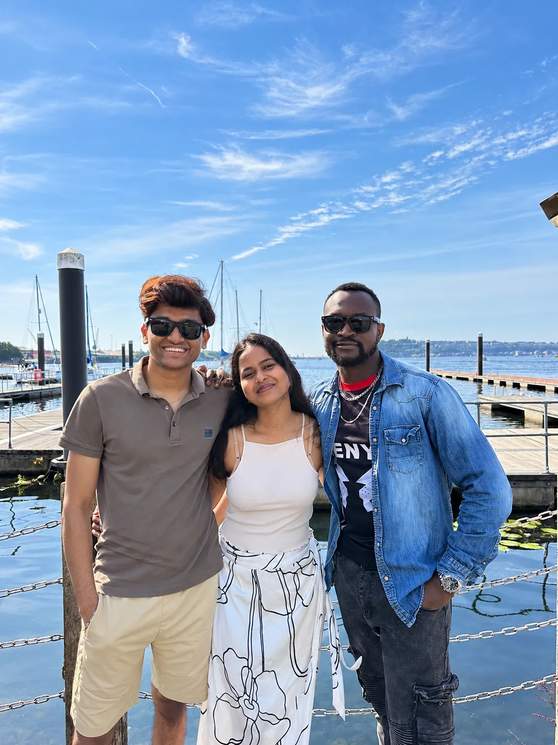 The three Kahawa Roots founders together by a marina