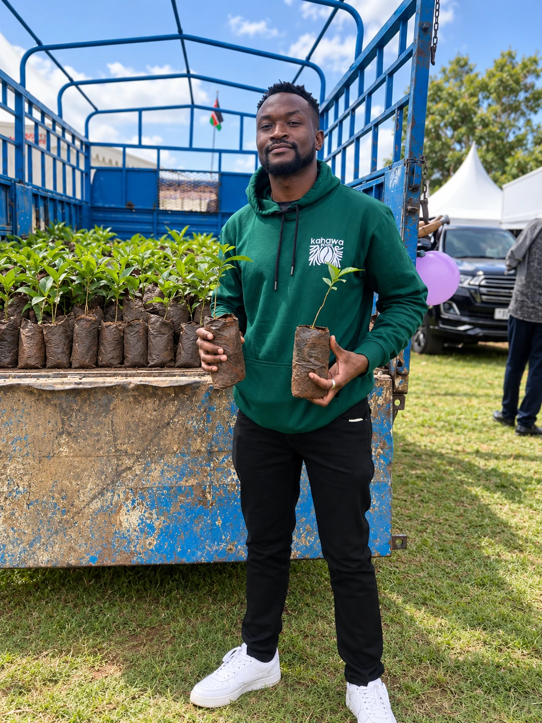 A Kahawa Roots team member at a tree nursery